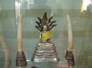 A silver Buddha image.